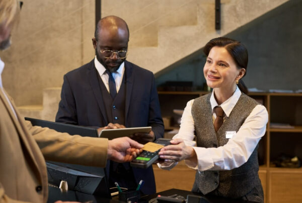 Guest paying at hotel checkout